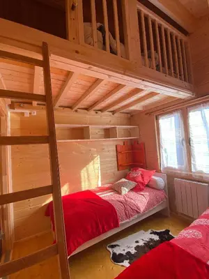 Un ou plusieurs lits dans un hébergement de l'établissement Les Chalets Du Marais