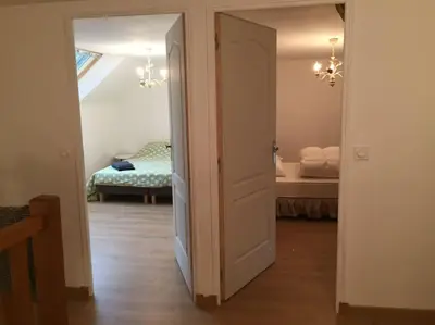 Un ou plusieurs lits dans un hébergement de l'établissement Maison de campagne