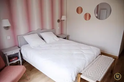 Un ou plusieurs lits dans un hébergement de l'établissement Maison d'hôtes 