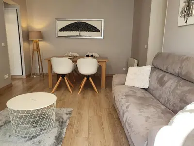 Coin salon dans l'établissement GRAND T3 70m2 ,COSY TOUT CONFORT ,2 CHAMBRES, 6 PERSONNES ,PARKING PRIVÉ SÉCURISÉ
