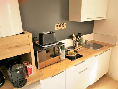 Cuisine ou kitchenette dans l'établissement Le Renommé Soissons par Picardie Homes