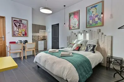 Cuisine ou kitchenette dans l'établissement Les Appartements Fénelon