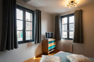 Télévision ou salle de divertissement dans l'établissement Les Chambres du Champagne Collery