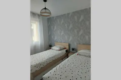 Un ou plusieurs lits dans un hébergement de l'établissement Gîte en bord de Meuse