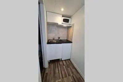 Cuisine ou kitchenette dans l'établissement Halte Mignonne