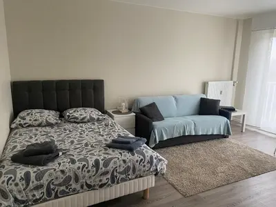 Un ou plusieurs lits dans un hébergement de l'établissement Appartement Parc de Fresnoy
