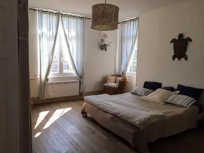 Un ou plusieurs lits dans un hébergement de l'établissement VILLA HENRI