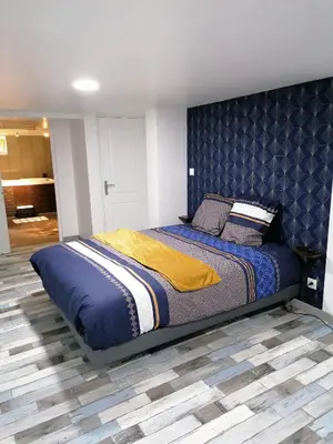 Un ou plusieurs lits dans un hébergement de l'établissement Chambre privé chez Chris
