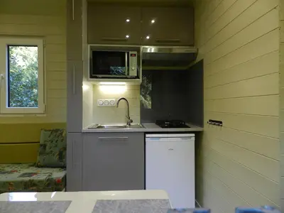 Cuisine ou kitchenette dans l'établissement Gîte Les Marlières