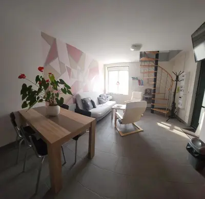Coin salon dans l'établissement la halte des trois rivieres