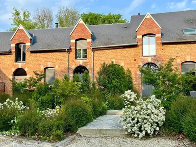 Jardin de l'établissement Aux Petits Lapins de Sorval, sauna privé, fitness