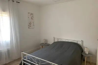 Un ou plusieurs lits dans un hébergement de l'établissement Hyper centre Maison le petit Bouchon