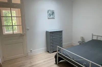 Un ou plusieurs lits dans un hébergement de l'établissement Hyper centre Maison le petit Bouchon