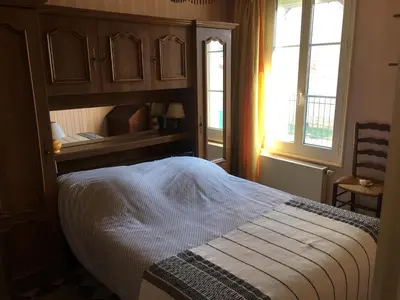 Un ou plusieurs lits dans un hébergement de l'établissement Le Refuge private entrance 2/4 pers dans maison 17eme siècle.Parking. calme