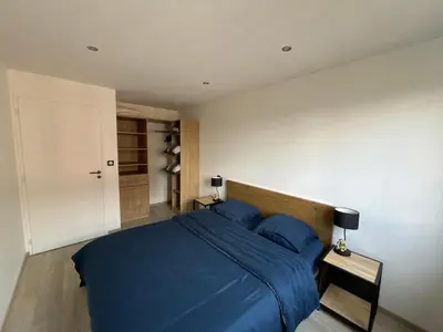 Un ou plusieurs lits dans un hébergement de l'établissement Appartement de Adrien Garage privé