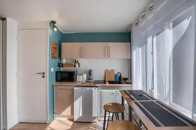 Cuisine ou kitchenette dans l'établissement L'Alexandrin