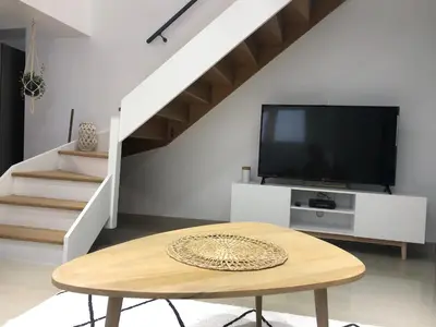 Télévision ou salle de divertissement dans l'établissement Les Gouttes d'Or
