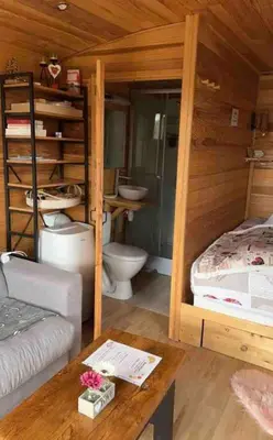 Un ou plusieurs lits dans un hébergement de l'établissement La Galipette, charmant chalet en Champagne