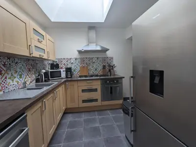 Cuisine ou kitchenette dans l'établissement Street app'Art