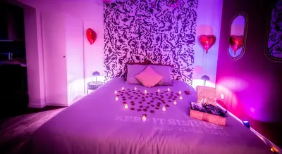 Un ou plusieurs lits dans un hébergement de l'établissement LoveSparadise -Suite Le Secret