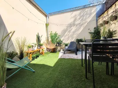 Jardin de l'établissement Les Grumes, Centre Ville, Jardin,Self check-in, FreeWifi, Netflix
