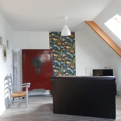 Télévision ou salle de divertissement dans l'établissement Les Hauts de Marle