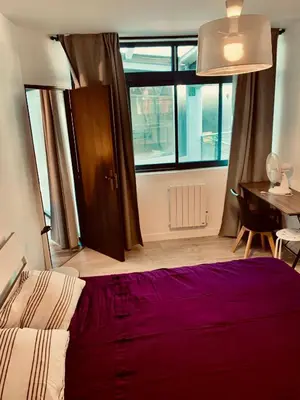 Un ou plusieurs lits dans un hébergement de l'établissement Superbe appartement en hyper centre de Charleville