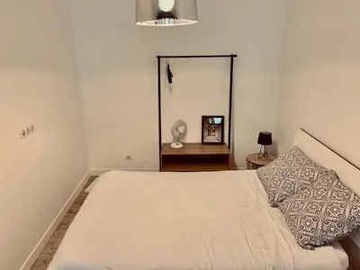 Un ou plusieurs lits dans un hébergement de l'établissement Superbe appartement en hyper centre de Charleville