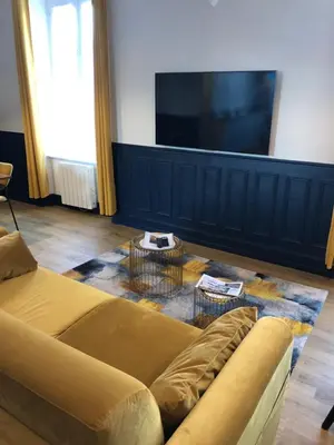 Télévision ou salle de divertissement dans l'établissement Le Saint Rémy by Sparnapart