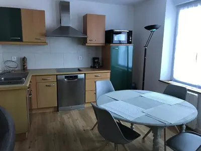 Cuisine ou kitchenette dans l'établissement Le saint Pierre