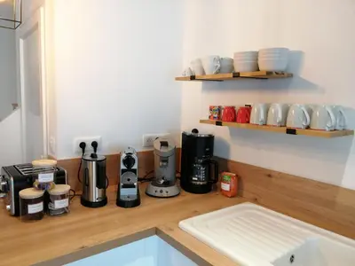 Cuisine ou kitchenette dans l'établissement Les Briquettes