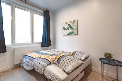 Un ou plusieurs lits dans un hébergement de l'établissement Plancy Beds St-Quentin