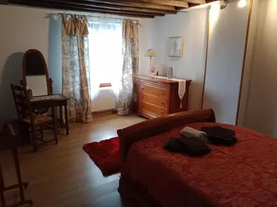 Un ou plusieurs lits dans un hébergement de l'établissement La Briarde chambre d'hôtes double seule