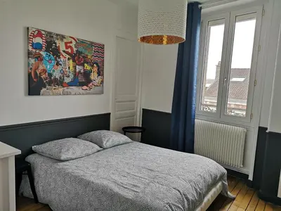 Un ou plusieurs lits dans un hébergement de l'établissement Luton Chic