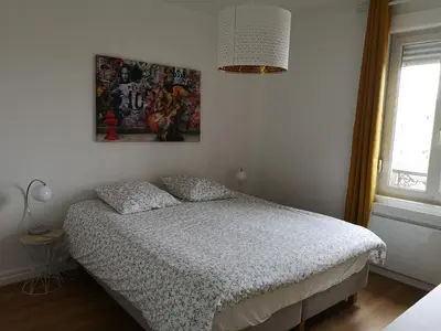 Un ou plusieurs lits dans un hébergement de l'établissement Luton Chic