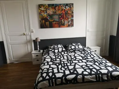 Un ou plusieurs lits dans un hébergement de l'établissement Luton Chic