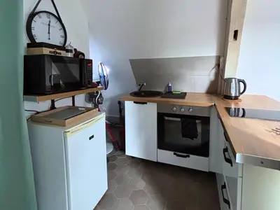 Cuisine ou kitchenette dans l'établissement Le Perchoir