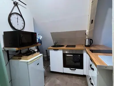 Cuisine ou kitchenette dans l'établissement Le Perchoir