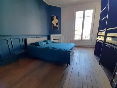 Un ou plusieurs lits dans un hébergement de l'établissement Magnifique maison avec terrasse