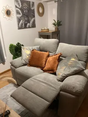 Coin salon dans l'établissement Agréable maisonnette de ville avec jacuzzi