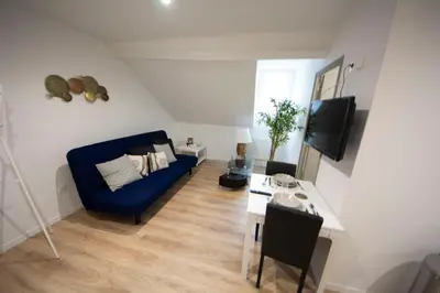 Télévision ou salle de divertissement dans l'établissement MALËiKA !!! Superbe T2 HOME STAGING avec parking gratuit !!!