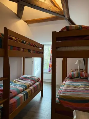 Un ou plusieurs lits dans un hébergement de l'établissement Cedar Cottage - Disney 30min
