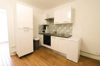 Cuisine ou kitchenette dans l'établissement Appartement cosy proche Cathédrale