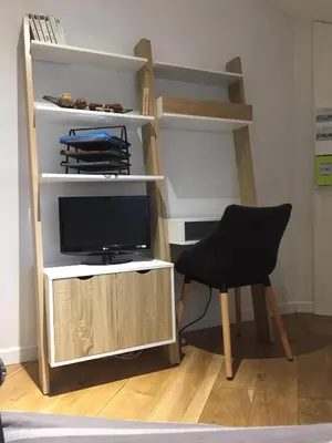 Télévision ou salle de divertissement dans l'établissement La Bulle
