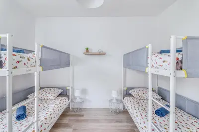 Un ou plusieurs lits dans un hébergement de l'établissement Le 12 - Freedomus Marne-la-Vallée
