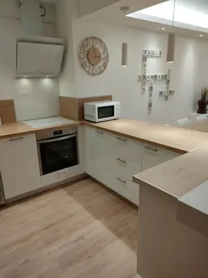 Cuisine ou kitchenette dans l'établissement Gîte 