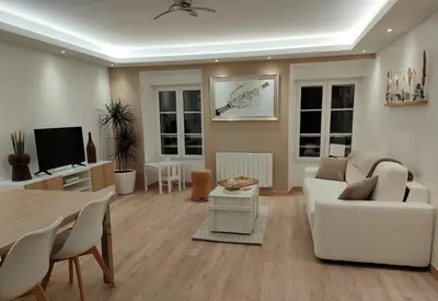 Télévision ou salle de divertissement dans l'établissement Gîte 
