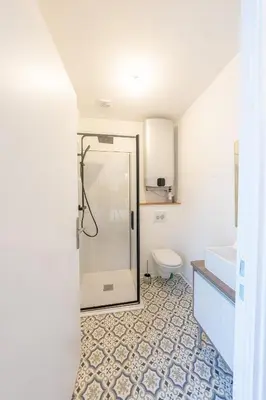 Salle de bains dans l'établissement L'elegant - Appart'Hotel Le Gatsby