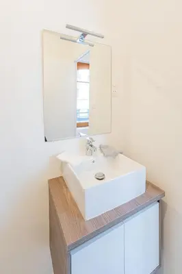 Salle de bains dans l'établissement L'elegant - Appart'Hotel Le Gatsby