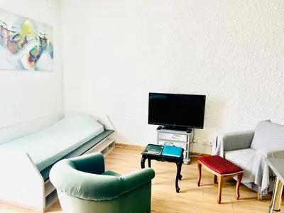 Télévision ou salle de divertissement dans l'établissement Ravissant T2 proche centre-ville et Jard